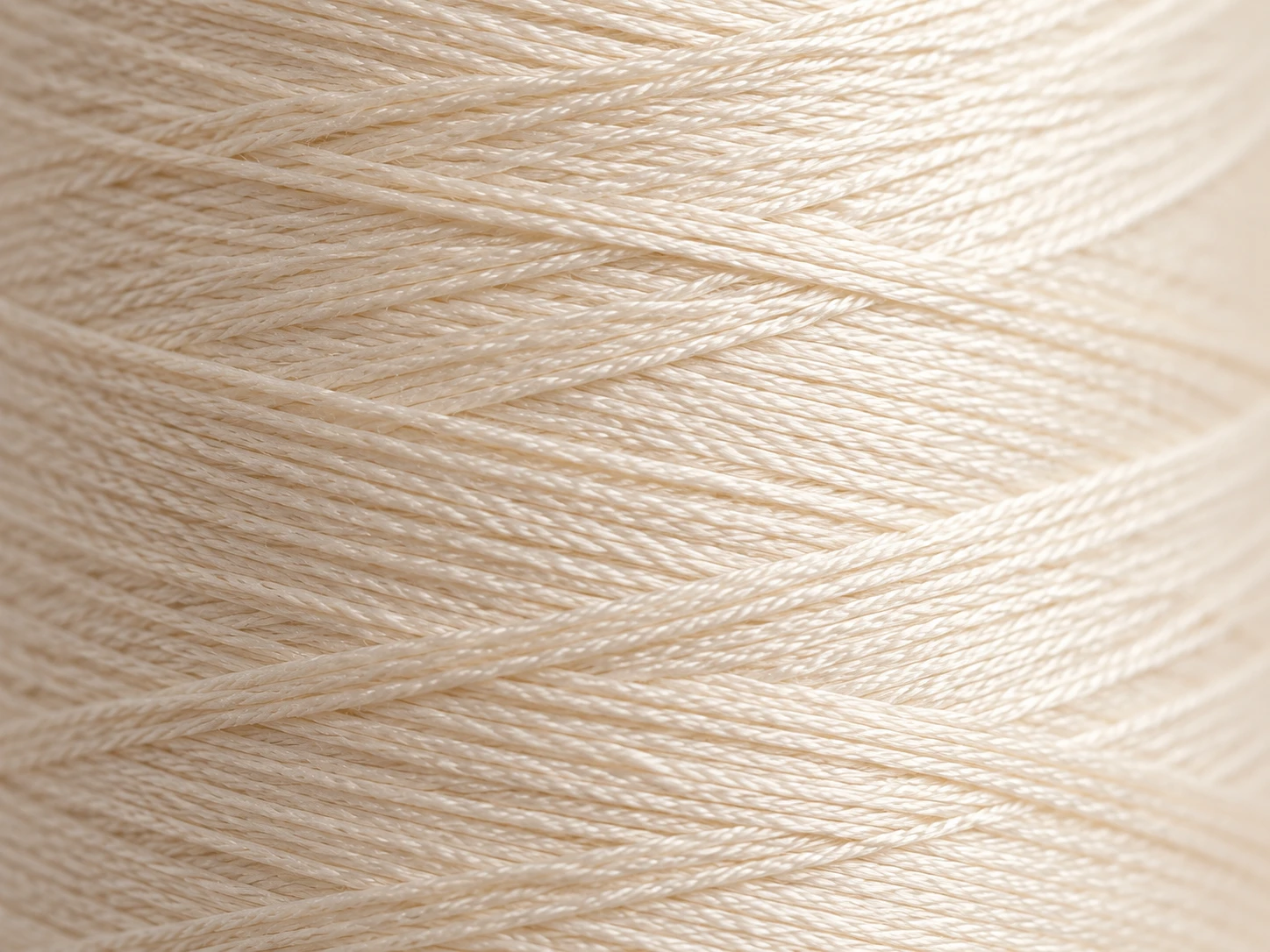 Close detail of wound sewing thread